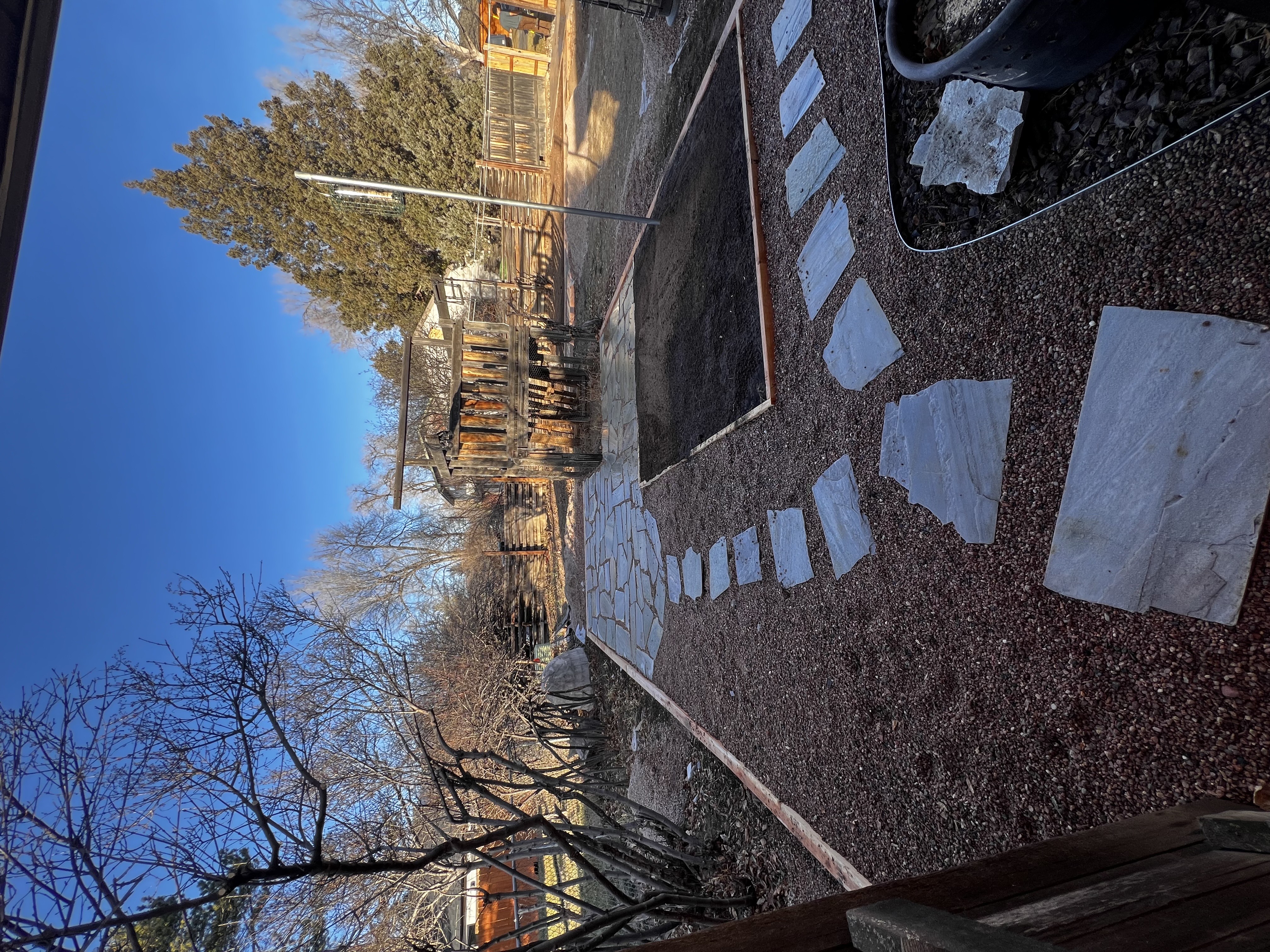 Xeriscape design with decorative gravel and stepping stones